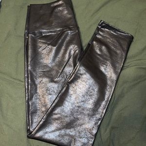Black leather-like leggings. Never worn. Great condition